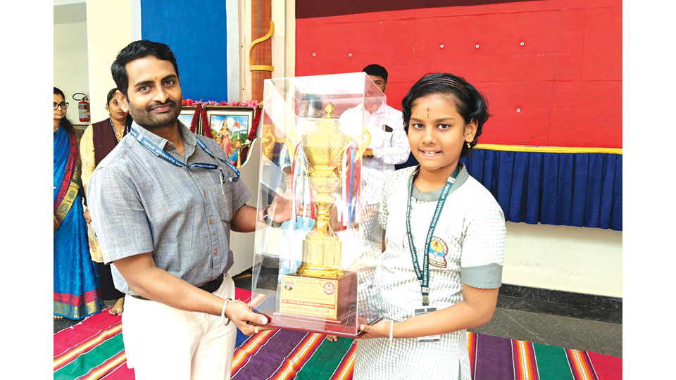 Wins 1st prize in Folk Song