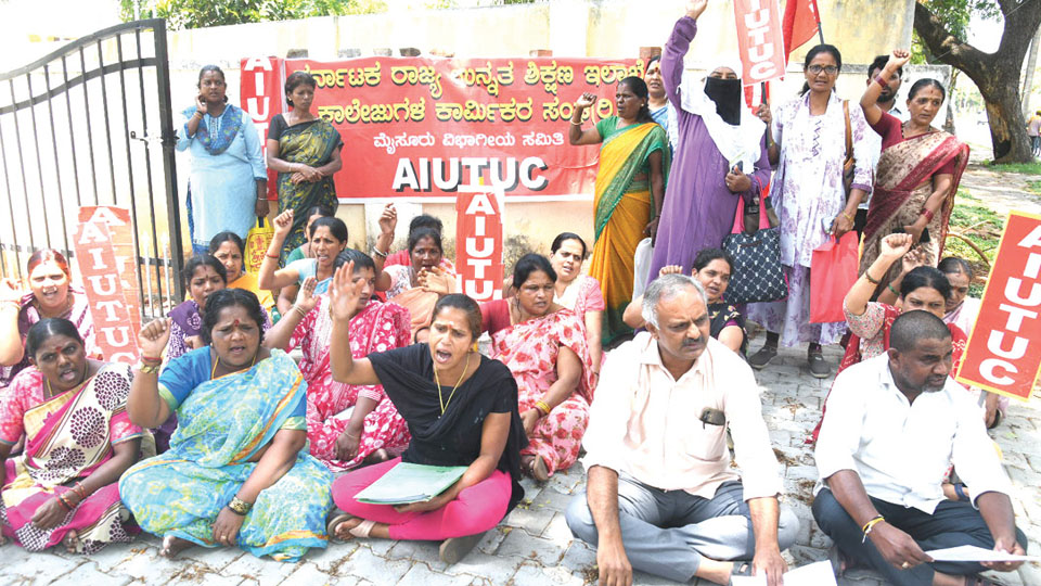 Protest seeking continuation of College Development Committee workers