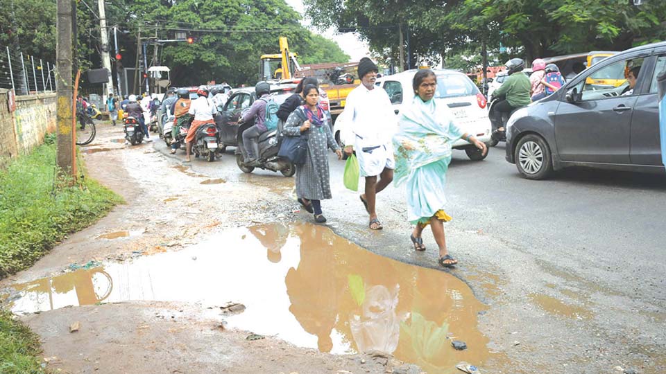 Road taxpayers rewarded with pothole-filled streets