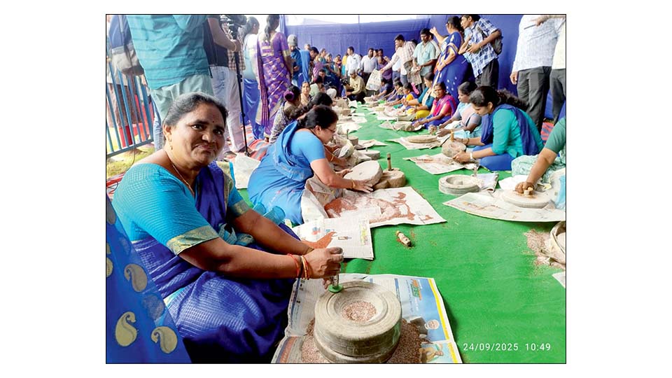 Women showcase skill in ragi grinding competition