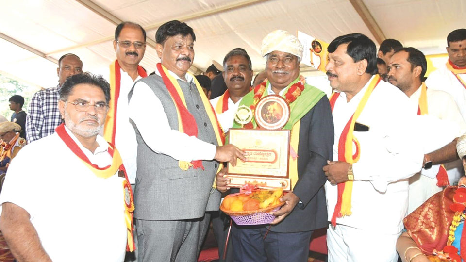 MCCI President Lingaraju feted with District Kannada Rajyotsava Award