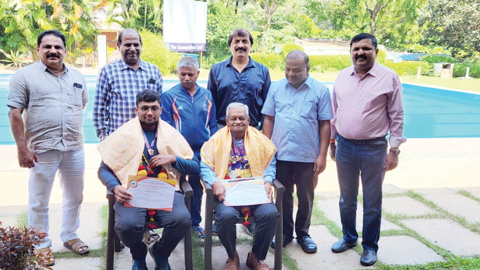 Medal-winning swimmers feted