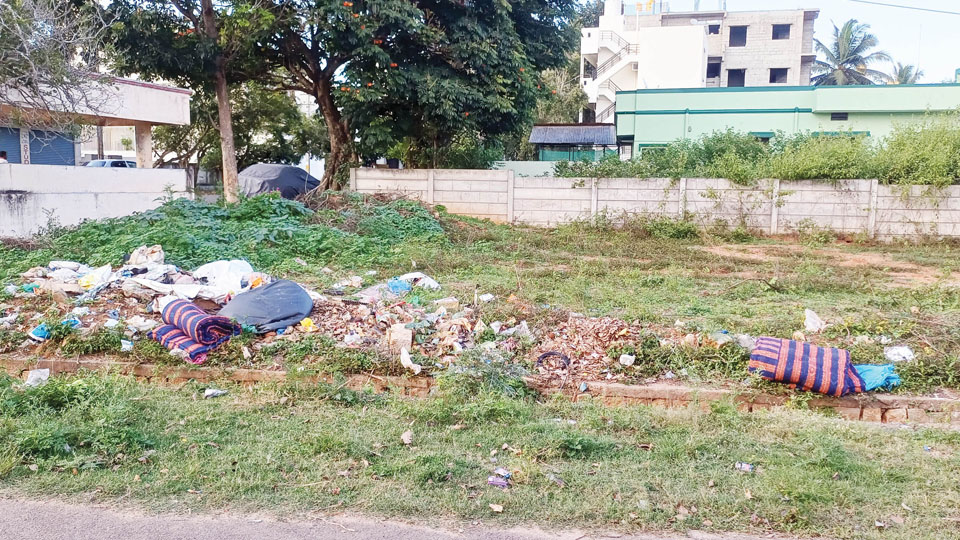 Garbage dumping on vacant plot in Vijayanagar 2nd Stage