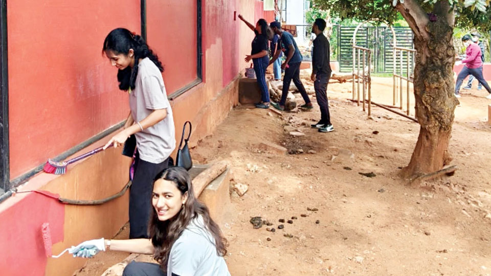 140 volunteers paint PFA Animal Rescue Shelter