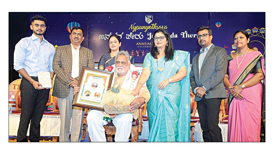 Nypunya Gaurava presented to Padma Shri Dr. Hassan Raghu during Nypunyothsava