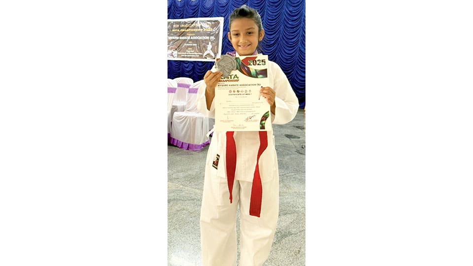 Wins silver medal in Karate