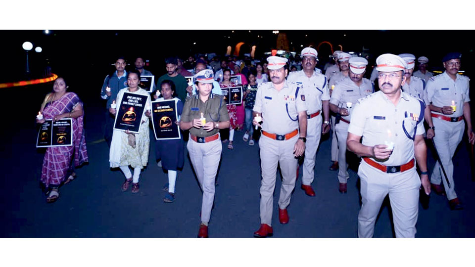 Road Safety Month by City Traffic Police: Candlelight march mourns death of helmetless riders