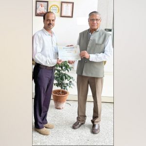 Wins award for Best Oral Presentation