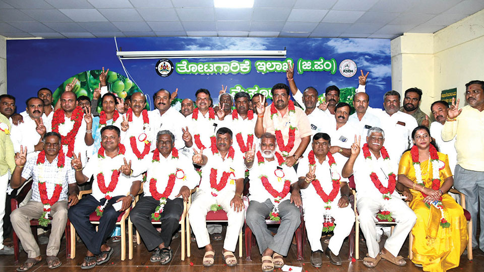 Hosahundi Raghu-led group wins big in HOPCOMS polls