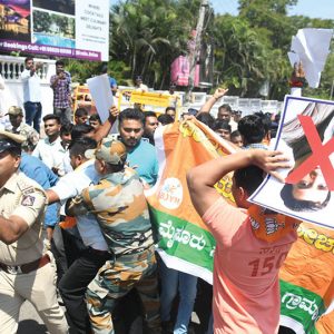 Youth Congress’ shirtless protest during AI Summit: Police foil BJP’s attempt to lay siege to Congress Office