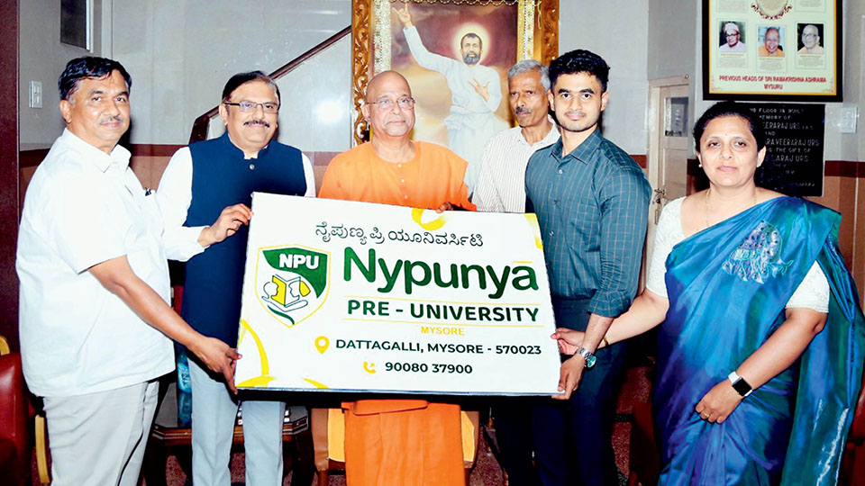 Swami Muktidanandaji unveils logo of Nypunya PU College