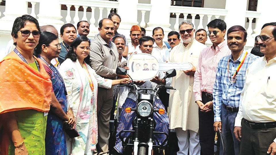 MLA distributes tricycles