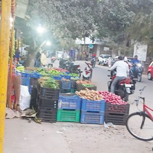 Clear encroachment of Sangam Circle footpath