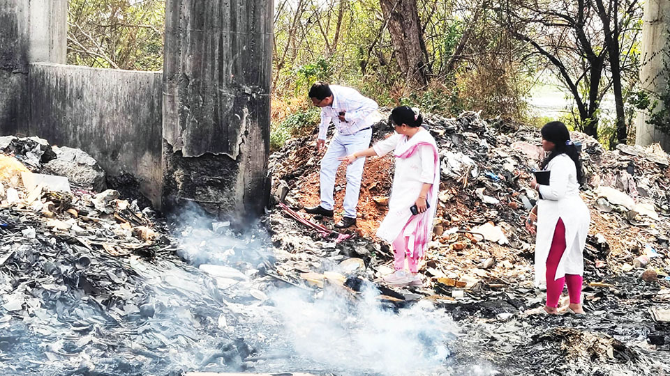 Waste burning below Varuna Canal aqueduct