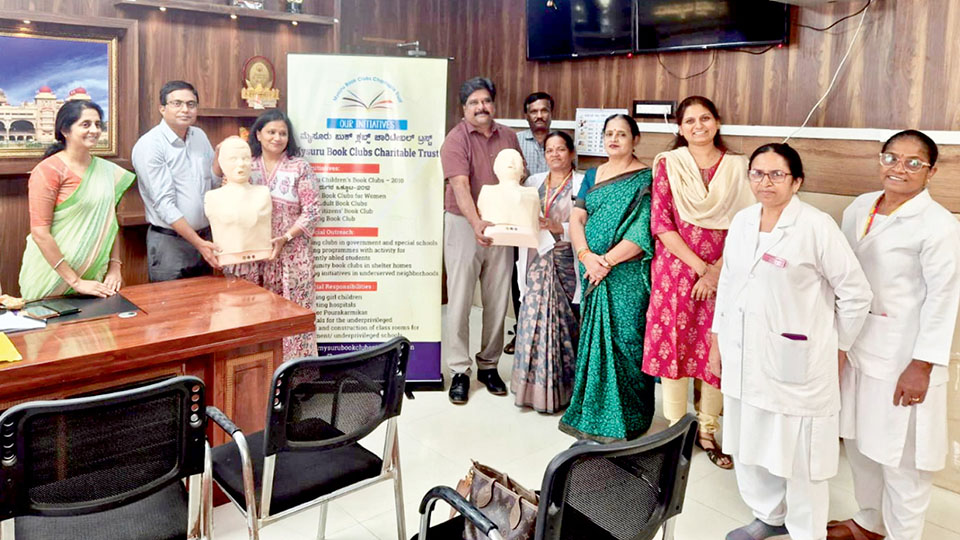 Mysuru Book Clubs Charitable Trust donates CPR mannequins to District Hospital