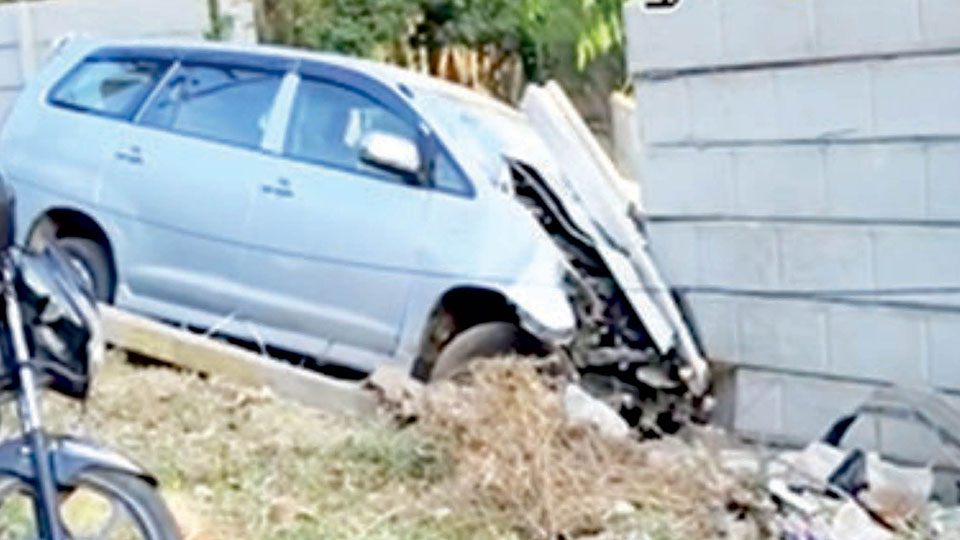 Vehicle damaged after ramming into electric pole