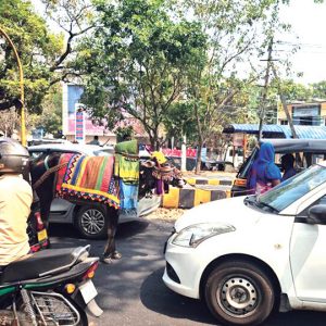 ‘Basava’ holds traffic for alms...