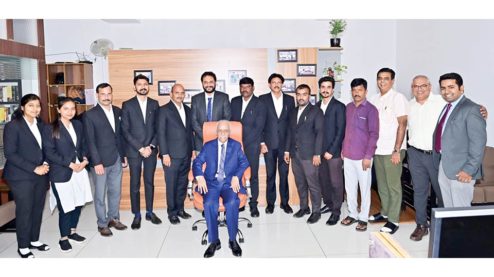 NHRC Chairperson visits law firm in Mysuru