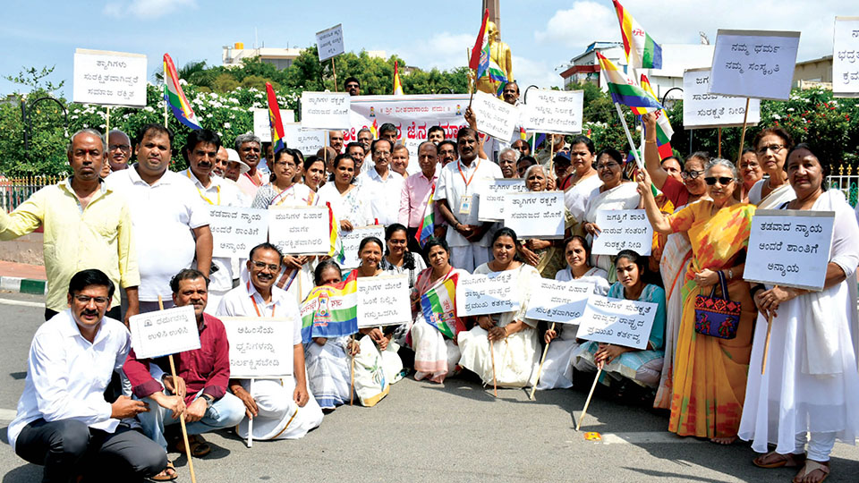 Jain community members stage silent protest