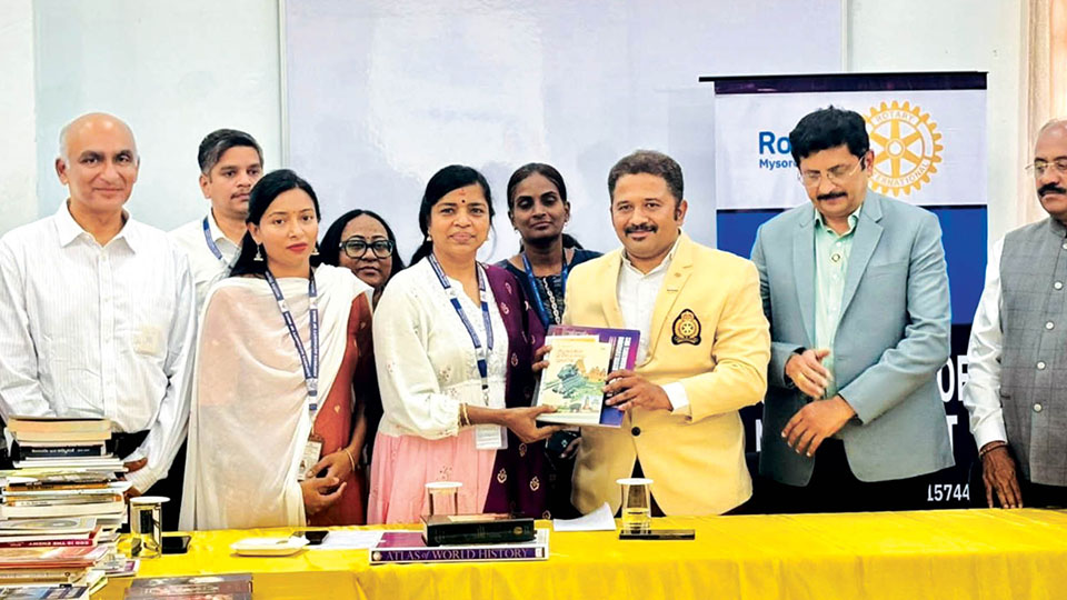 Books handed over for proposed Flybrary at Mysore Airport