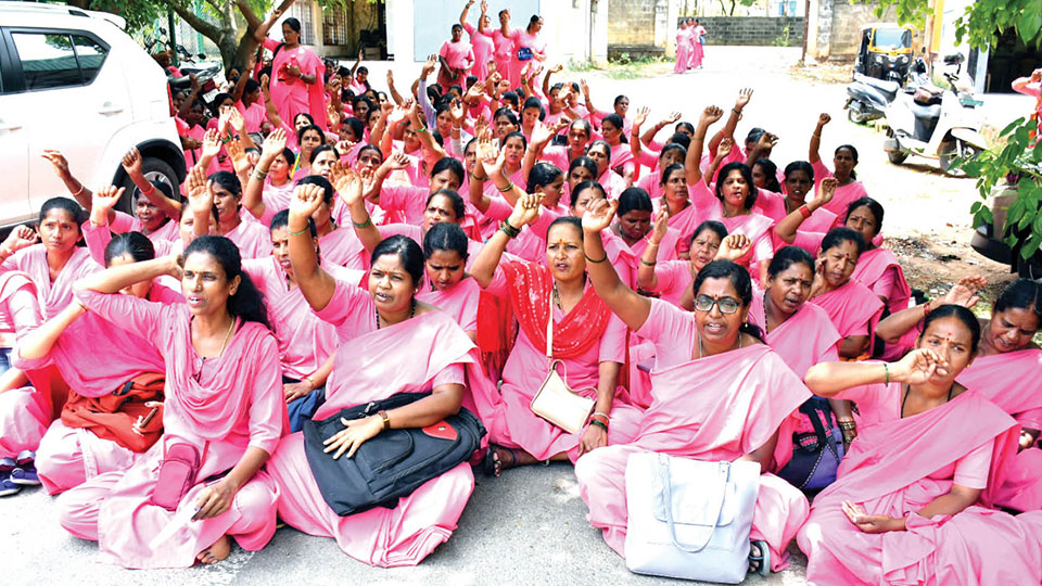 ASHA workers stage protest