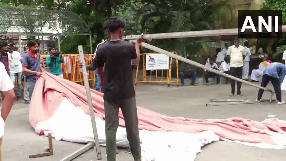 DMK workers remove tents, party banners
