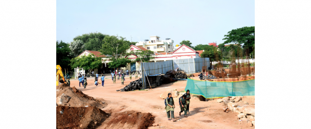 125-year-old Government School buried behind mounds of mud