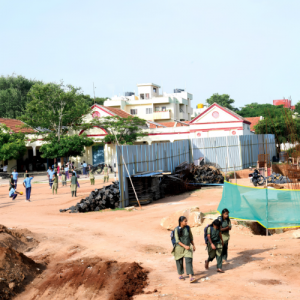 125-year-old Government School buried behind mounds of mud 