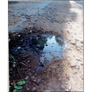 Close this stinking open manhole in Bogadi South