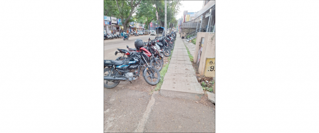 Two-wheelers encroach busy Kalidasa Road