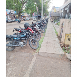 Two-wheelers encroach busy Kalidasa Road