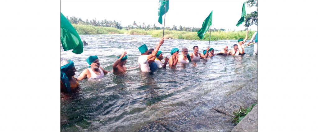 Farmers enter Cauvery River, stage protest